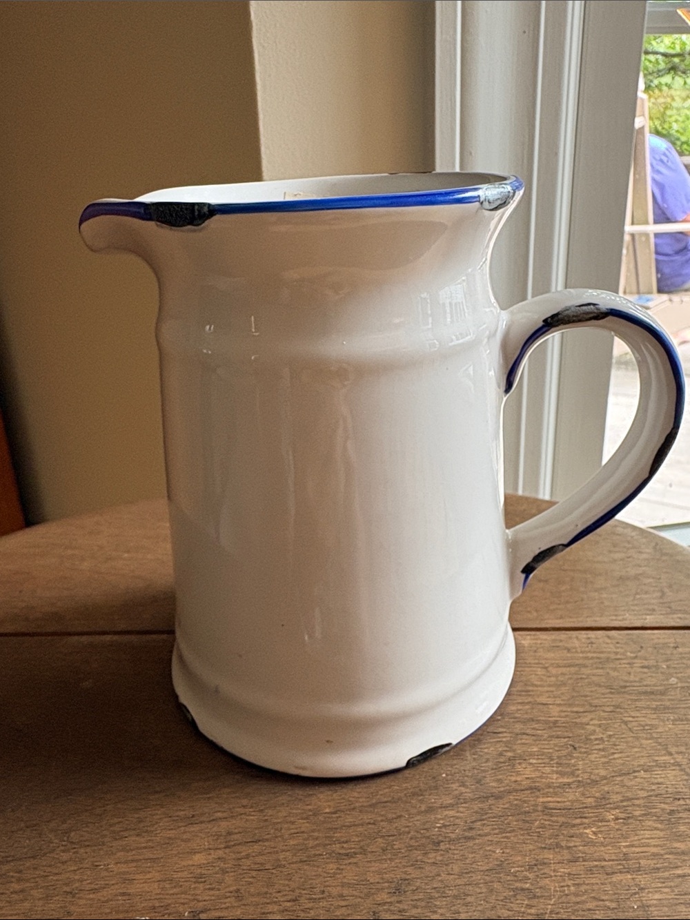Classic White Ceramic Pitcher with Blue Accent